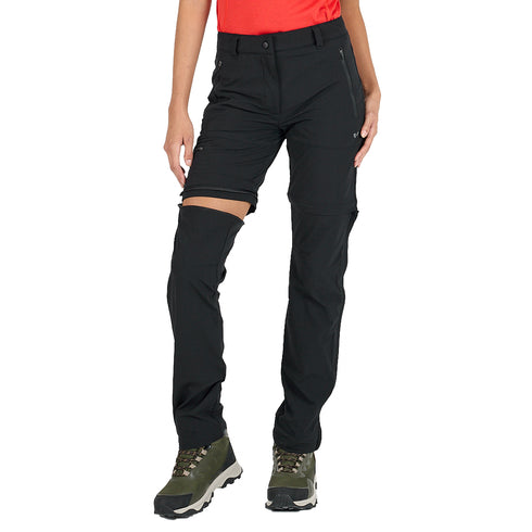 Frau zeigt die Zip Off Funktion einer schwarzen Trekkinghose aus Merinowolle.