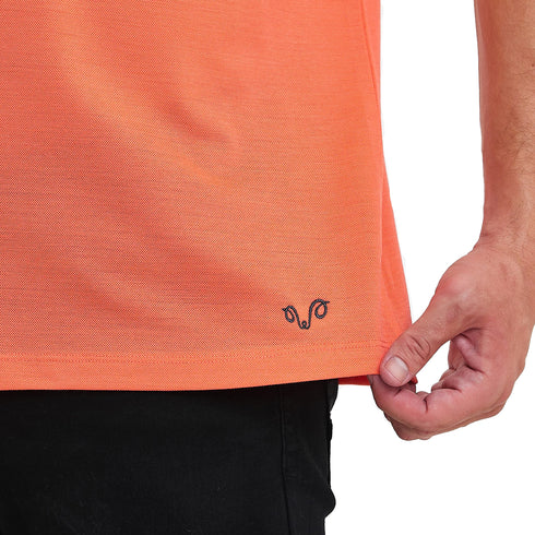 Merino Polo Shirt in der Farbe Apricot mit Woolona Logo