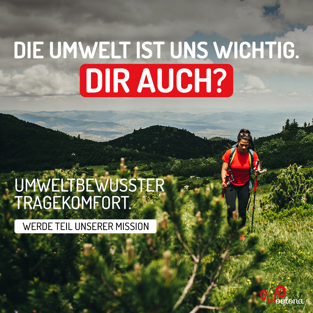 Frau wandert in der Natur und trägt umweltschonendes Merino-T-Shirt
