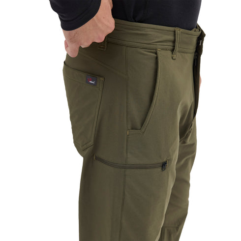 Grüne Wanderhose für Herren aus Merinowolle mit verschiedenen Taschen.