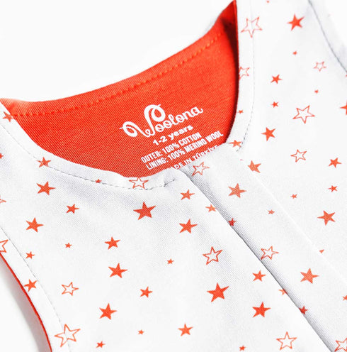 Merinowolle Schlafsack mit Füßen in orange mit Sternen