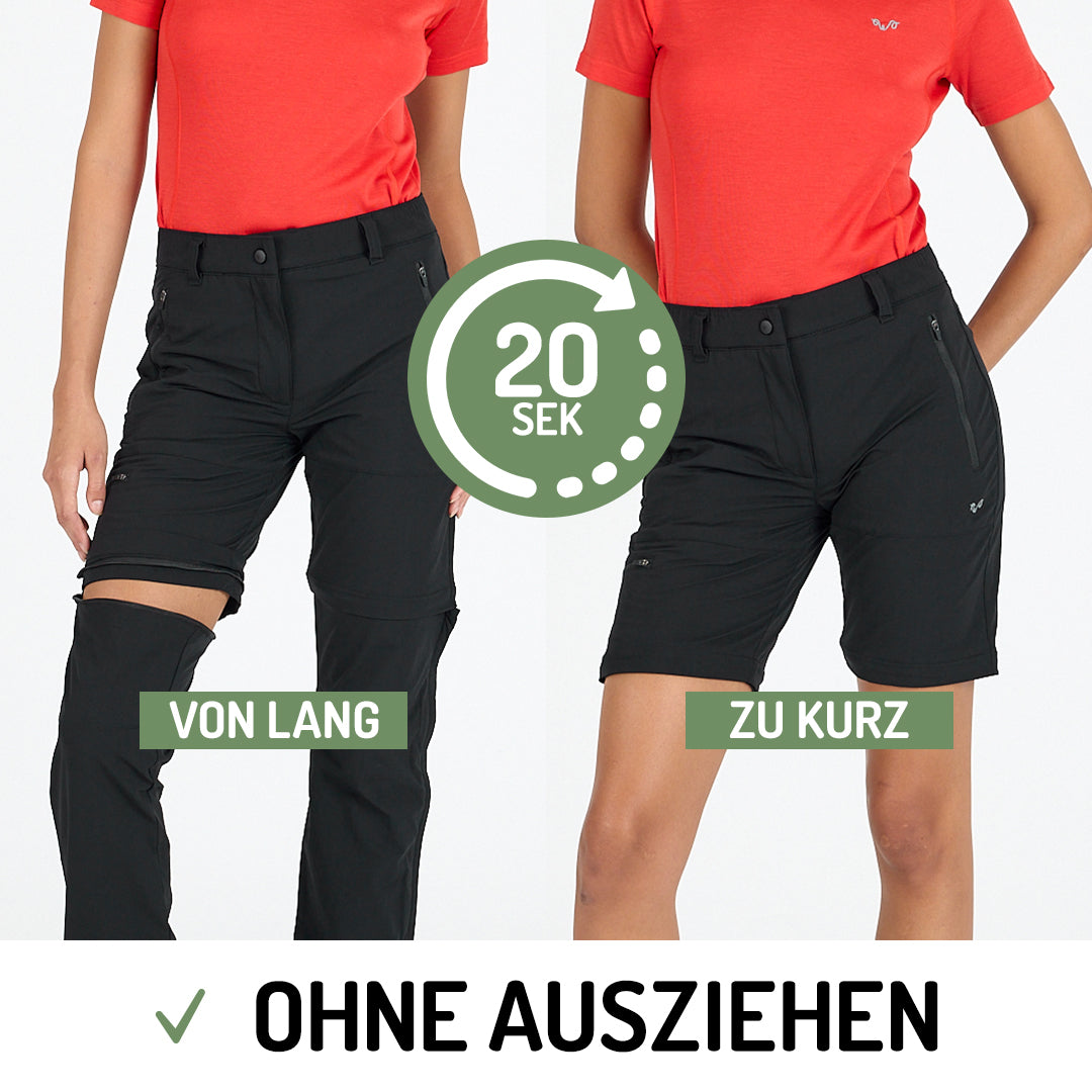 Dame in einer Merino Zip Off Hose  in der Farbe schwarz mit orangem T-Shirt.