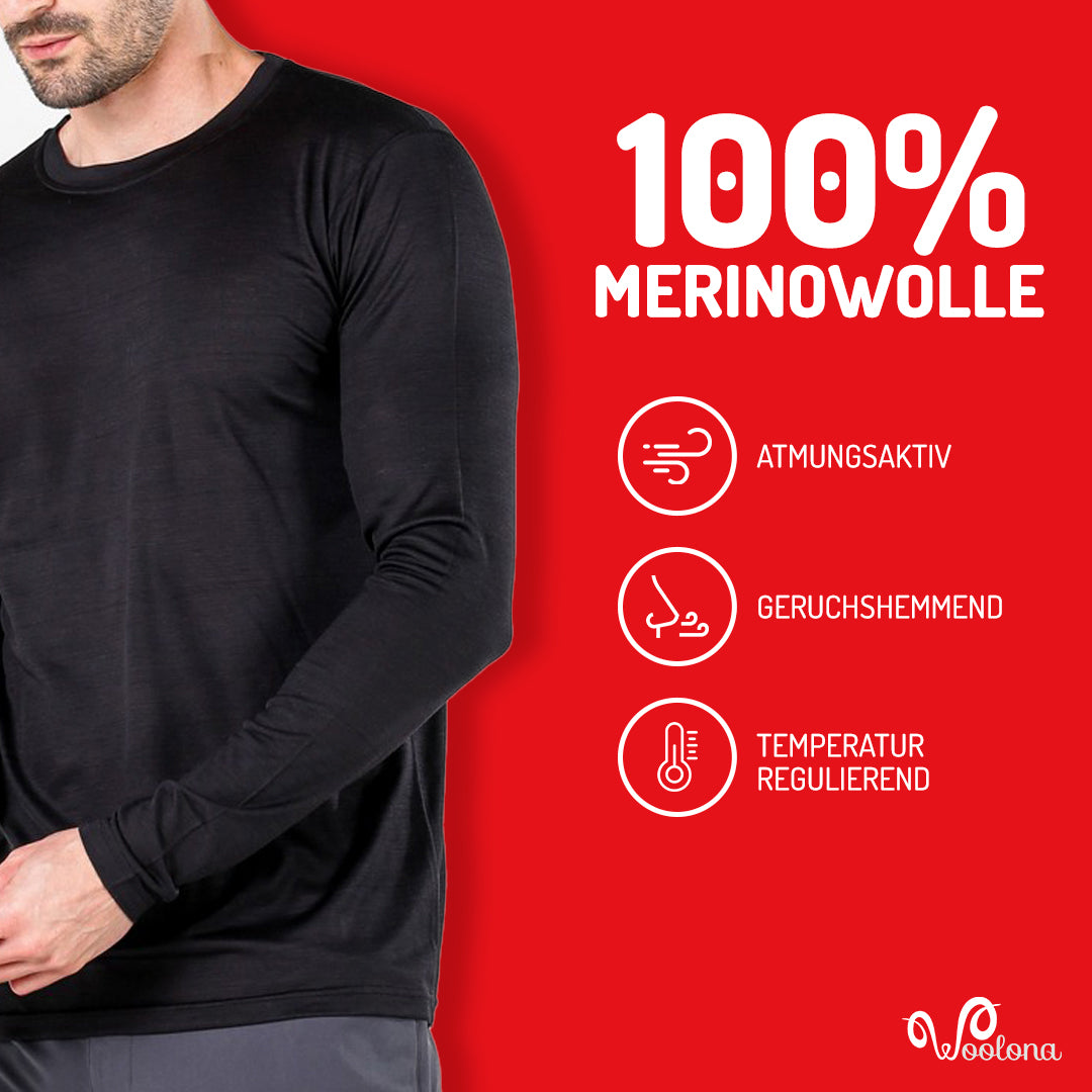 Ein Mann trägt schwarzes Merino-Oberteil. Es ist atmungsaktiv, geruchshemmend und temperaturregulierend.