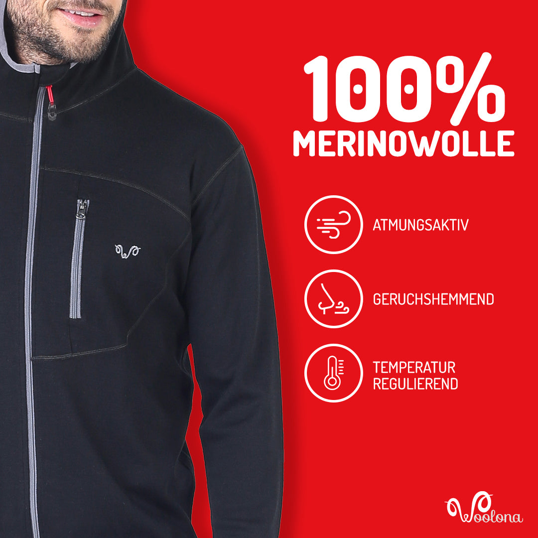 Mann in einem atmungsaktiven  schwarzen Merino-Hoodie.